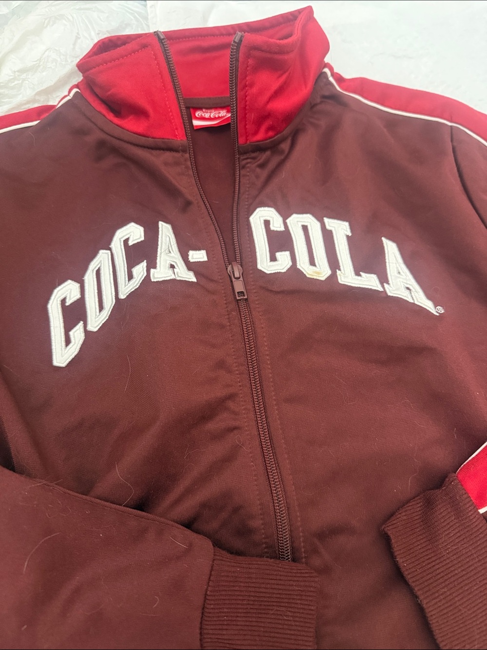 Coca-Cola Brown Jacket with Red Collar and Shoulder Stripes